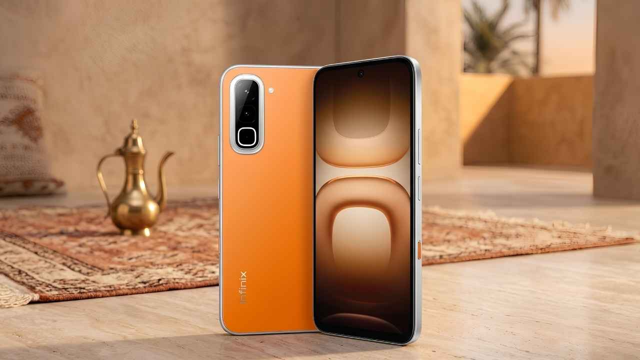 Infinix Hot 70 Thermo Orange variant standing on a table with a sleek premium look