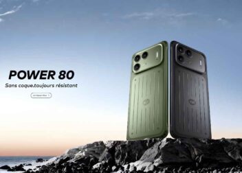 Rugged and durable itel Power 80 smartphone standing on coastal rocks