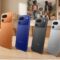 Four units of the Tecno Spark 50 Pro in Dynamic Orange, Midnight Blue, Titanium Grey, and Cloud White showcasing their premium rear camera module.